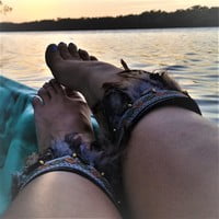 Brown Feathers with coin, black pleather base