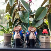 Boot Cuffs with blue feathers and colorful beaded pompoms
