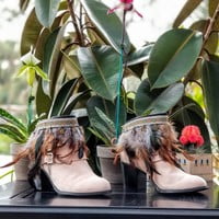 Brown Feathers with coin, black pleather base