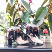 Black feathers, Small orange feathers,  grey pleather, purple lace with beads,