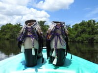Black feathers, Small orange feathers,  grey pleather, purple lace with beads,
