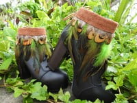 Green feathers, brown feathers, brown leather